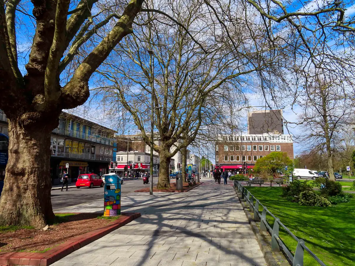 Shoppers on tree-lined Above Bar Street in Southampton city centre
