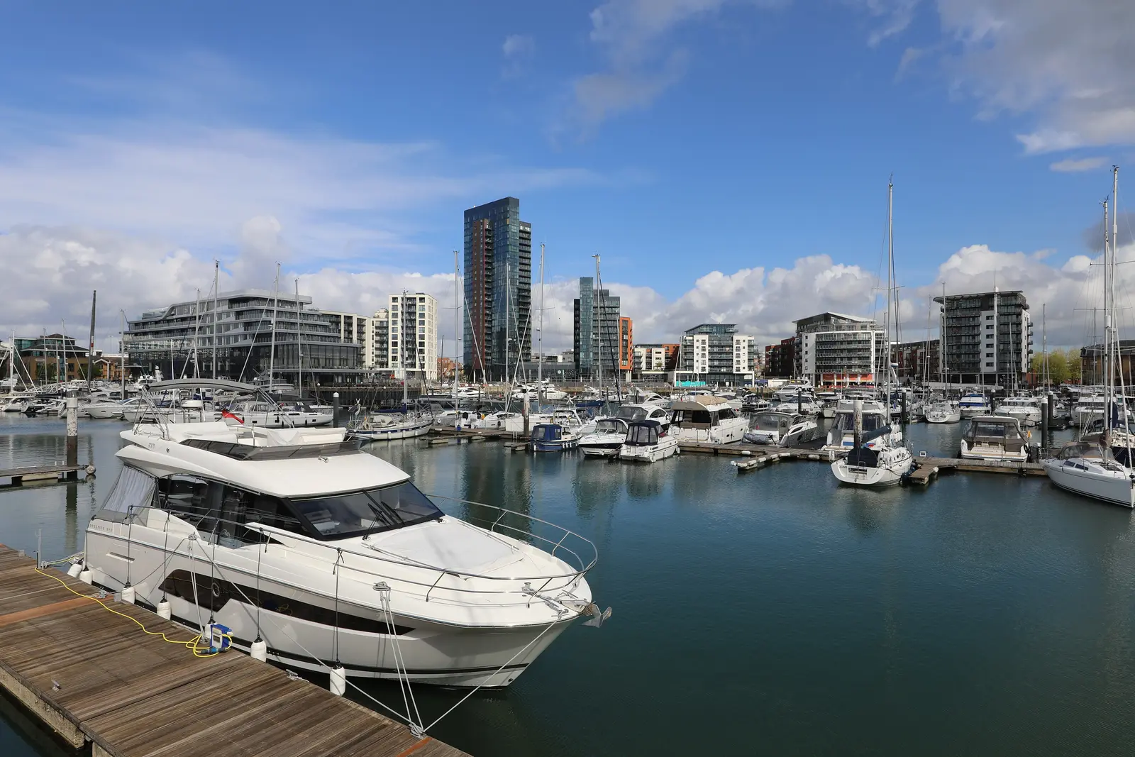 Ocean Village marina in Southampton with the hotel and residential towers behind