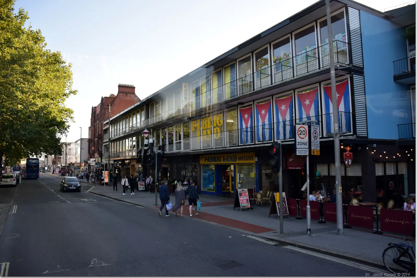 Pedestrians passing shops and restaurants on Above Bar Street, Southampton